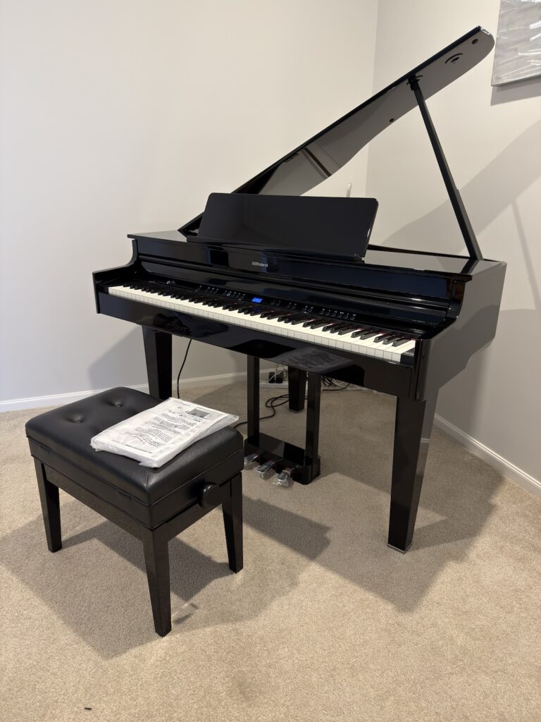 Roland digital grand piano positioned in a Melbourne home after professional delivery by JM & SONS Piano Movers
